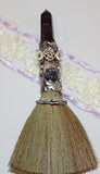 Broom with crystals