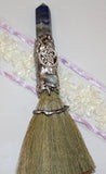 Broom with crystals