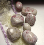 Cinnabarite tumbles