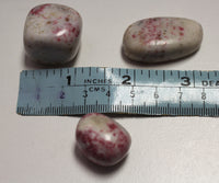 Cinnabarite tumbles