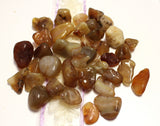 Honey agate tumbles