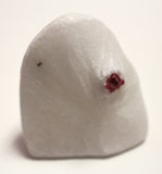 Red spinel on marble