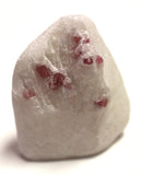 Red spinel on marble