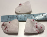 Red spinel on marble