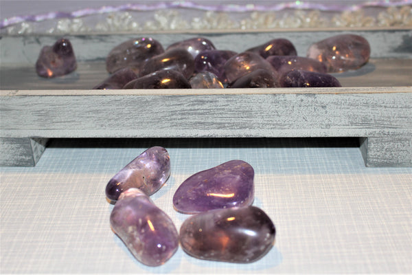 large amethyst tumbles. $3.00 a piece. average size 2in or 5cm 