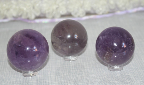 amethyst spheres approximately 2 inch or 5cm in diameter.$40.00 per piece 