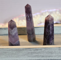 amethyst towers- 2.5-3.5 inches or 6.5-9cm in height. $25.00 per piece 