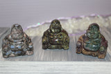 two inch or 5cm high carved laughing buddha, $25.00 a piece