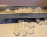 These are tumbled clear quartz  Average size from 1-1 1/4 inches or 3cm .  $1.50 per piece. 