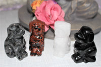 cute 2 inch carved crystal dogs, Quartz, larvikite, black obsidian or mahogany obsidian. 20.00 dollars a piece o