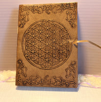 Embossed leather with three different designs, Flower of life, elephant and owl. These journal are sandy brown in colour. All journals are 5x7 in size and have blank pages inside.34.00 dollars for journal. 