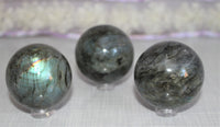Labradorite spheres approximately  2 in or 5cm in diameter. $40.00 per piece