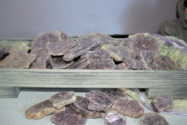 shiny lepidolite slab.   Average Size 1-2 inches or 2.5 to 5cm. 7.00 dollars per piece