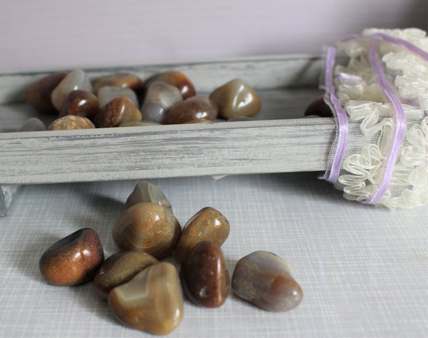 Natural Agate tumbles . Average Size- 1 in or 2.5cm . $2.00 per piece