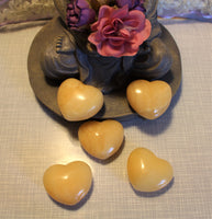 Beautiful Orange Calcite puffy heart. Average 2in or 5cm at the widest point. $15.50 per piece. 