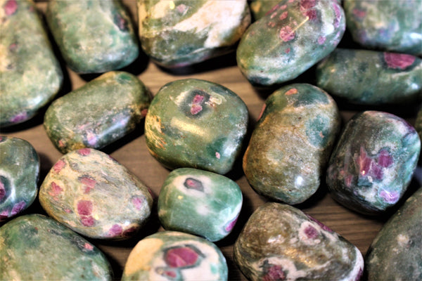 ruby zoisite crystal tumbles. 1-1.5inch or 2.5-3cm$8.00per piece 