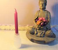 selenite candle holder. Cute tiny candle holder that will come with a candle. Colour of candle will vary.  Please note size- 2.75 inches in height or 7cm. $10.00 per piece
