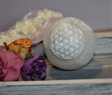 selenite sphere with flower of life symbol carved into it. 2 inches or 5 cm in diameter. $30.00 per piece