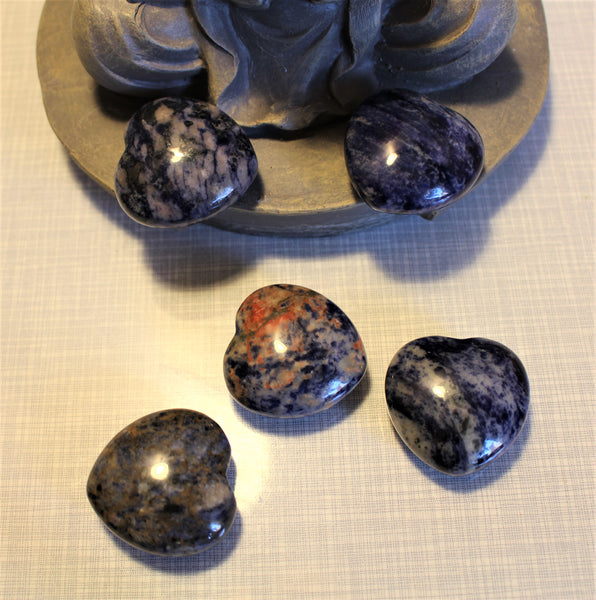 Beautiful puffy sodalite heart. 1.5 inches or 4cm at the widest. $15.50 per piece