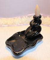 The waterlily back flow incense holder is 2.5 in or 6.5cm in height and 5 inches or 13cm in length. $15.00